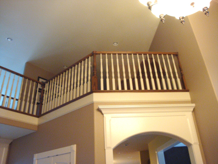 BEFORE: Original wood balusters at the Lakeview home.