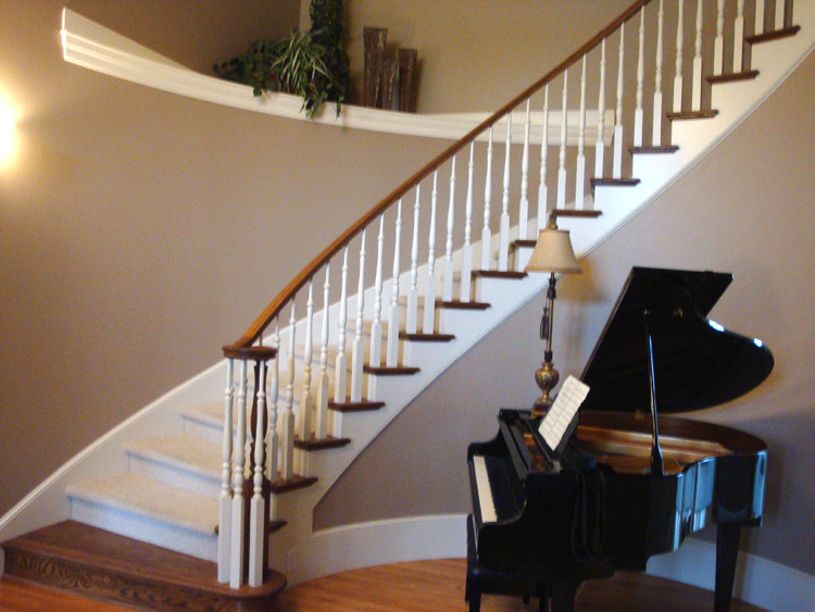 BEFORE: Additional view of the original wood balusters at the Lakeview home.