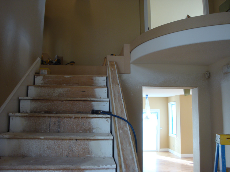 BEFORE: Additional view of the original staircase at the Camas home.