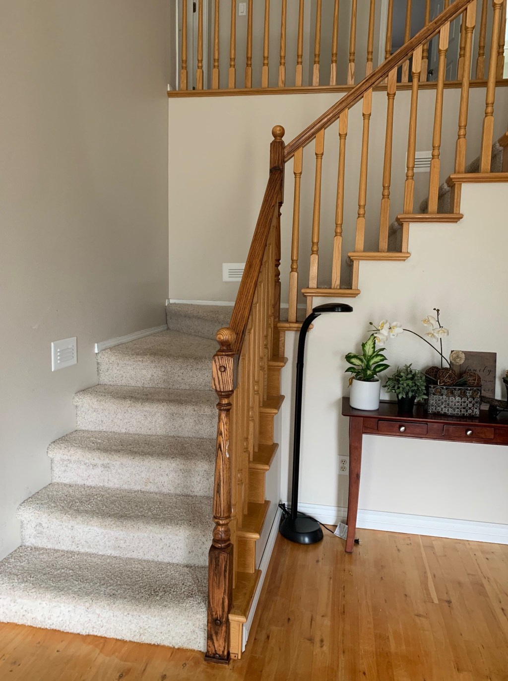 BEFORE: Original staircase before the client-designed remodel at the Camas home.