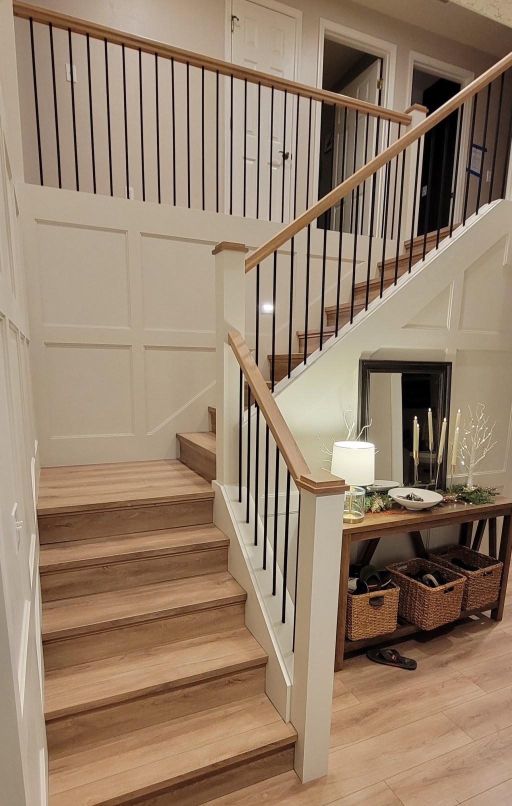 AFTER: New paint-grade railing with full wall wainscoting at the North Camas home.