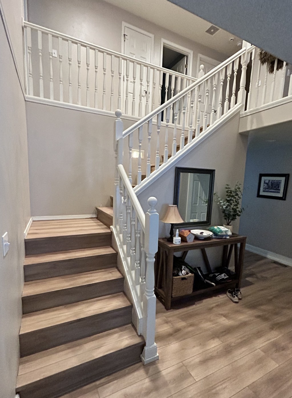 BEFORE: Loose and failing railing and balusters at the North Camas home.