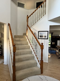 BEFORE: Original staircase before modernization at the South Salmon Creek home.