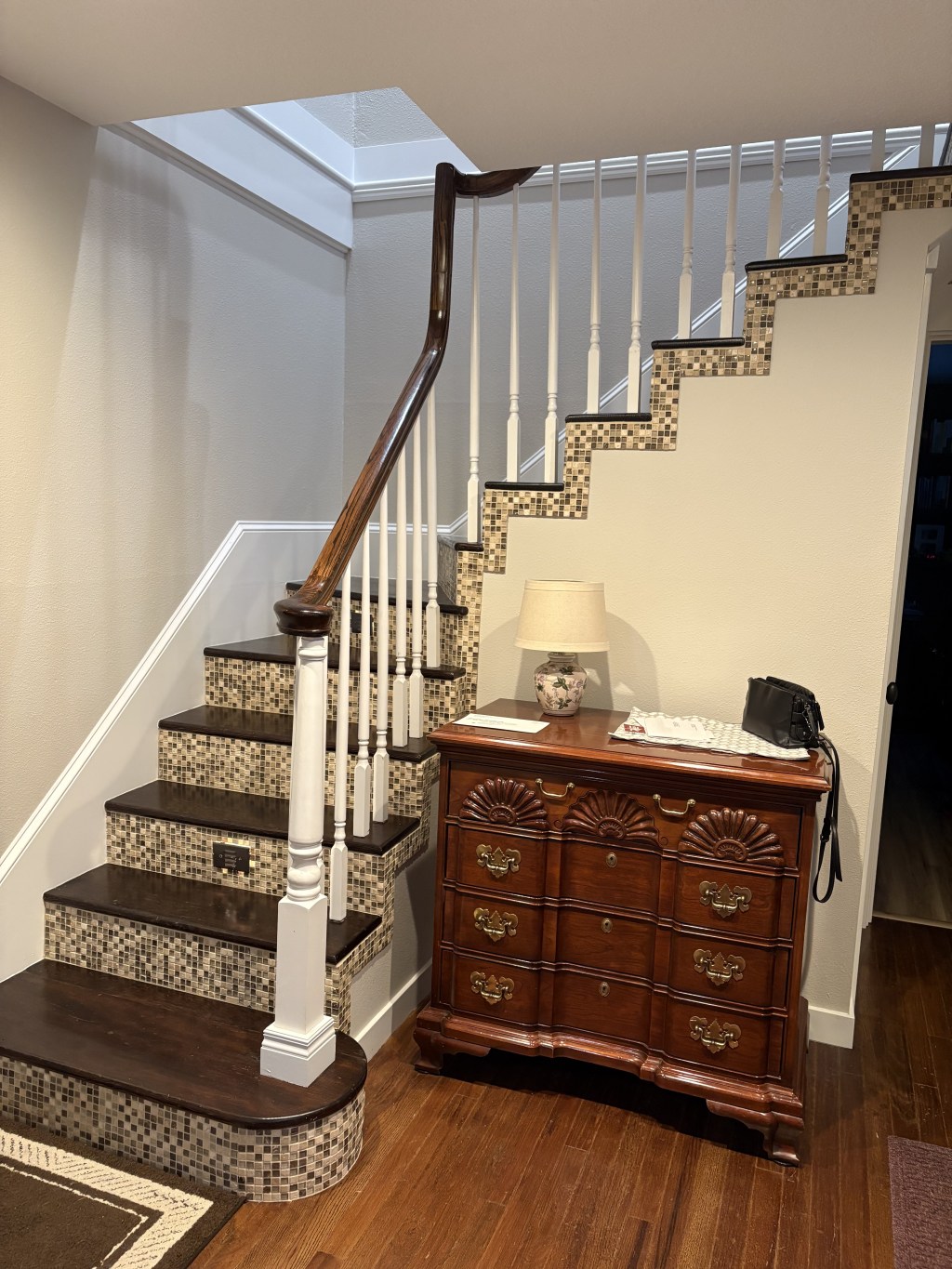 BEFORE: Original staircase with limited head clearance at the St. James home.