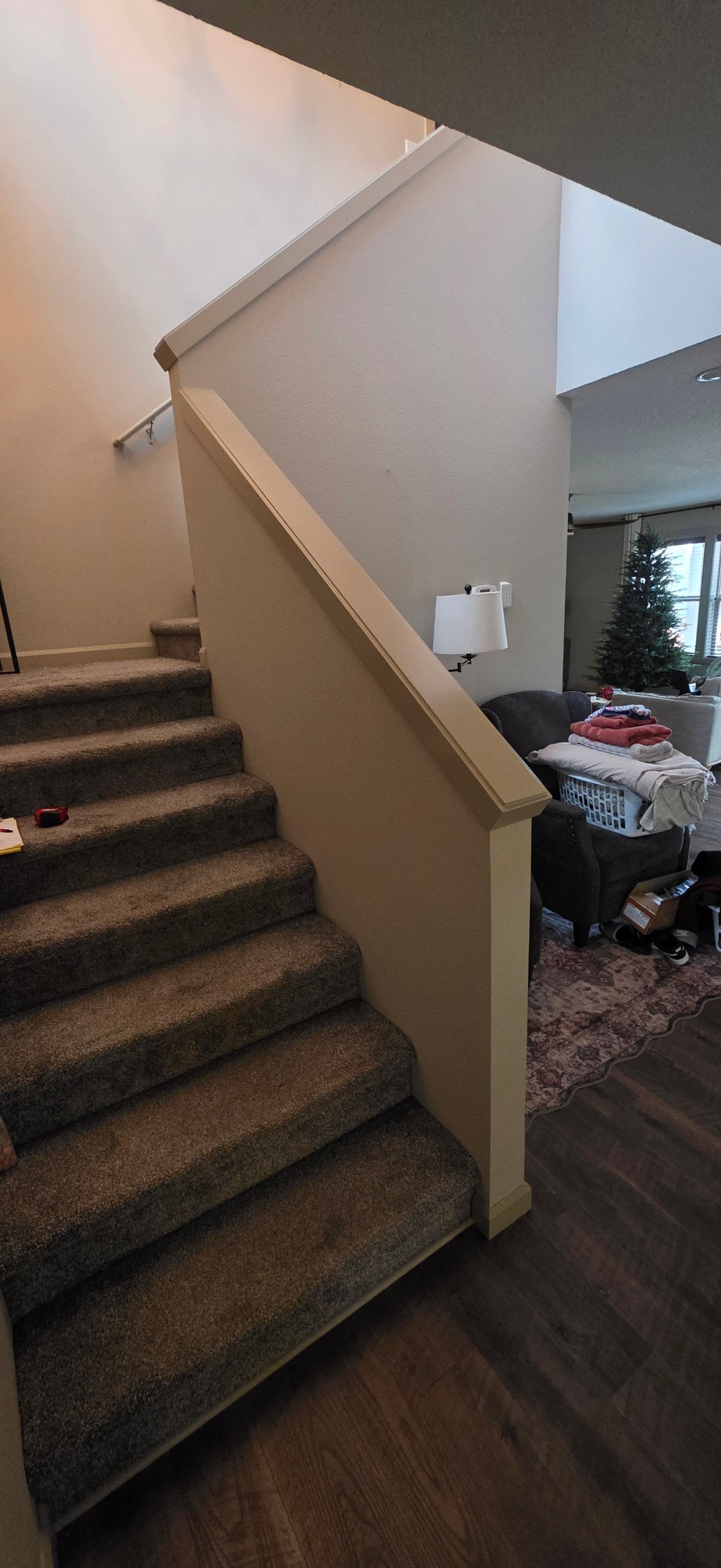 BEFORE: Original closed-in staircase at the St. Johns home.